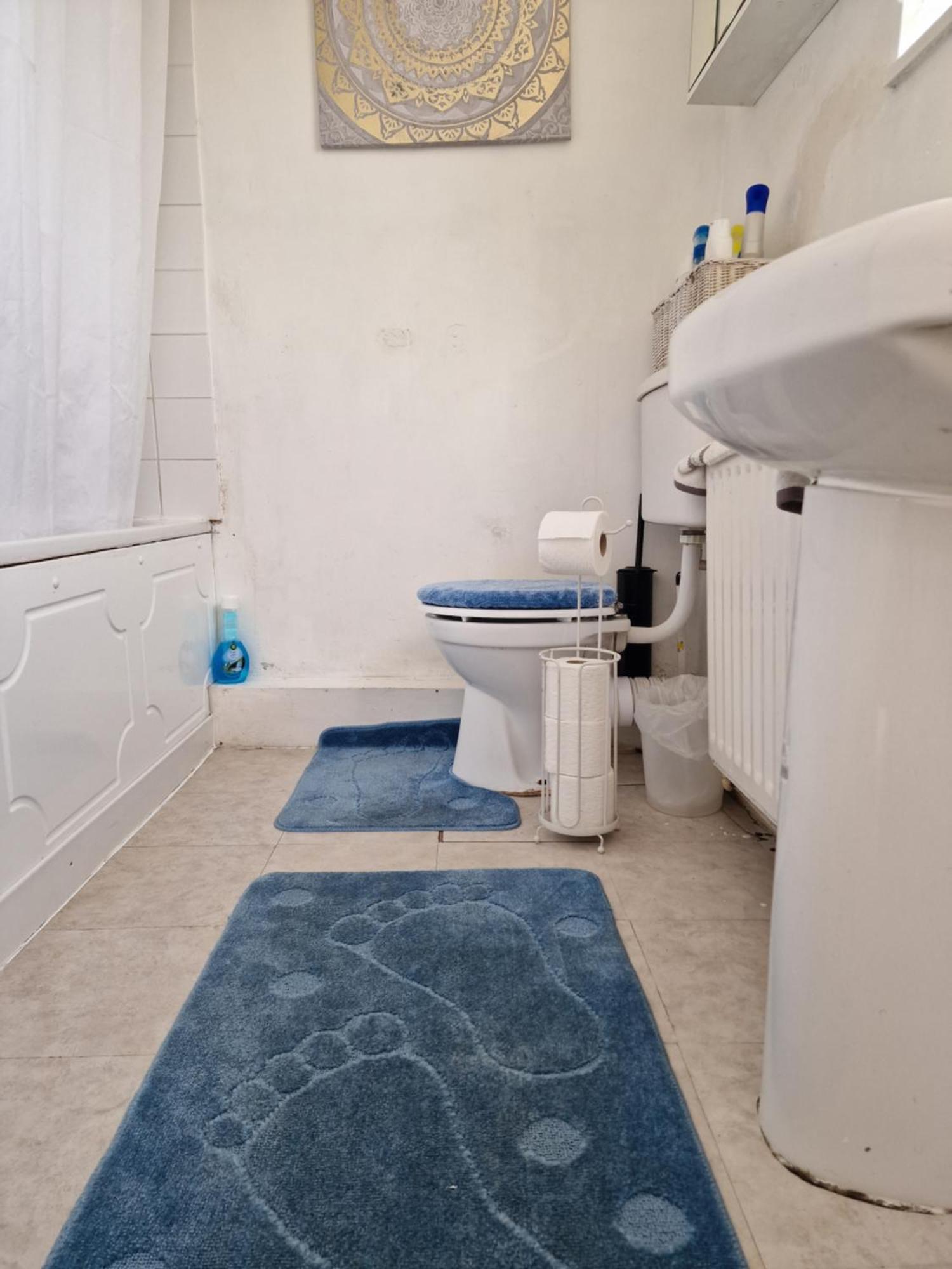 Quarto em Acomodações Particulares Spacious And Homely One Bedroom